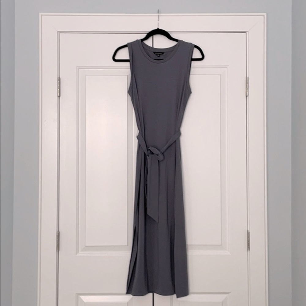 Bluish-grey column dress with belted waist.